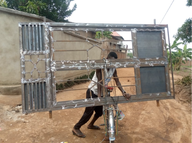 delivering a window on a bike delivering a window on a bike